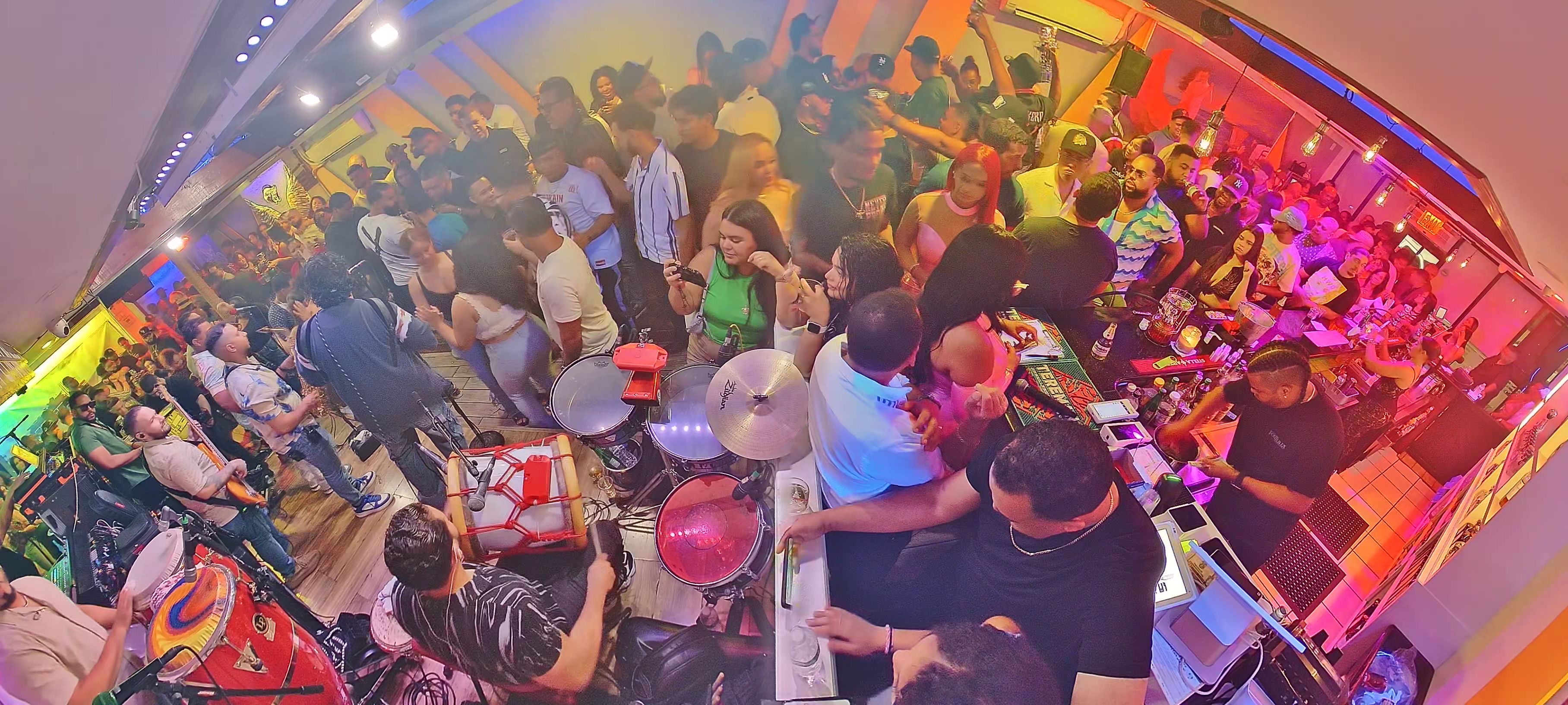 DJ playing music at Lugo Lounge nightlife event