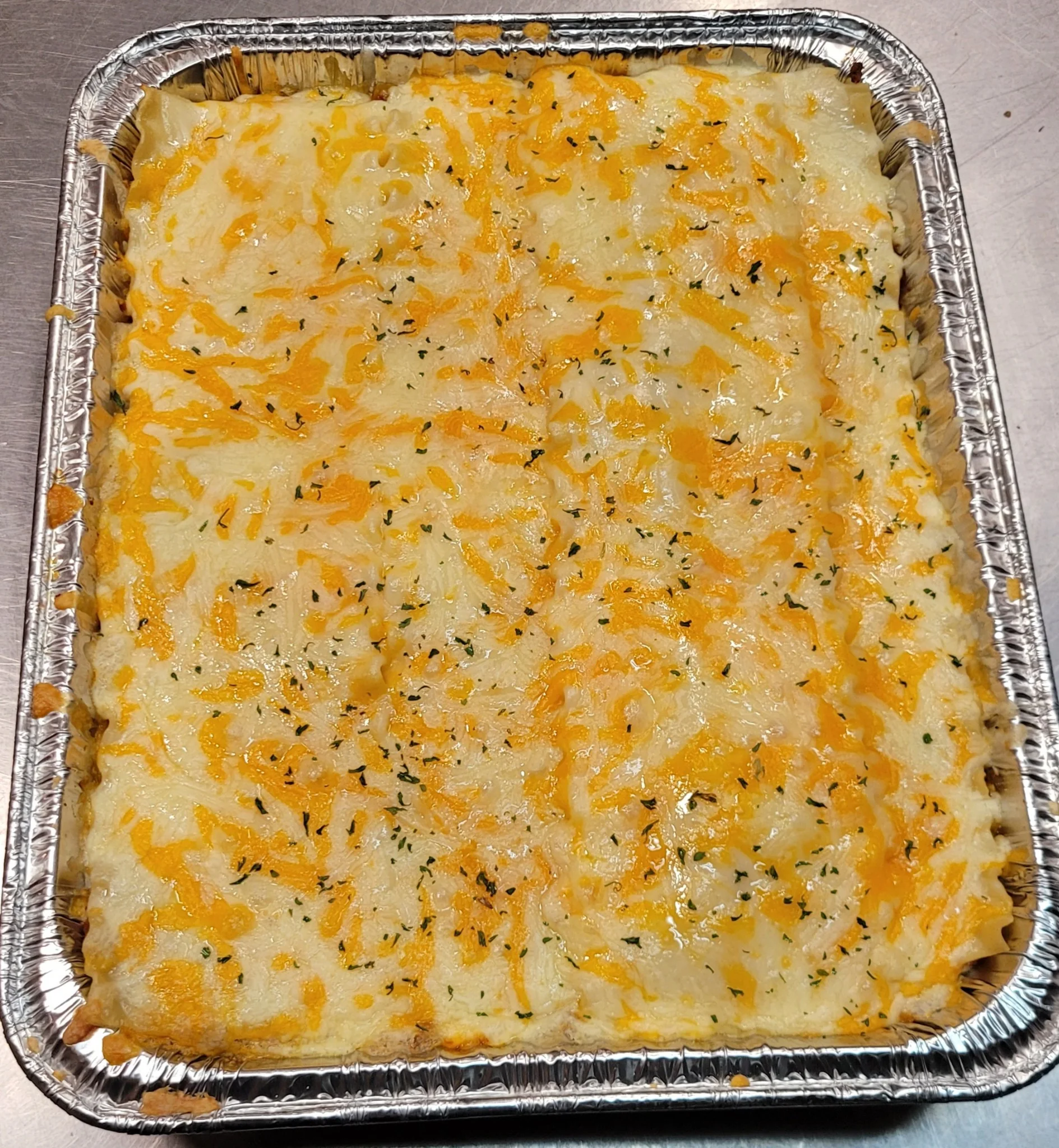 Lasagna catering tray from Lugo's Lounge
